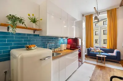 Kuchnia lub aneks kuchenny w obiekcie Red Brick Apartament w Rynku - ProperUNIT