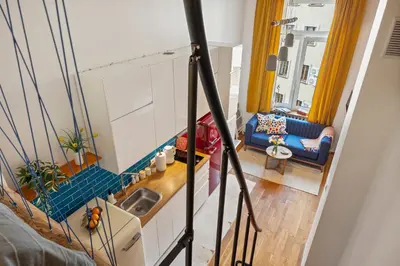 Łóżko lub łóżka w pokoju w obiekcie Red Brick Apartament w Rynku - ProperUNIT