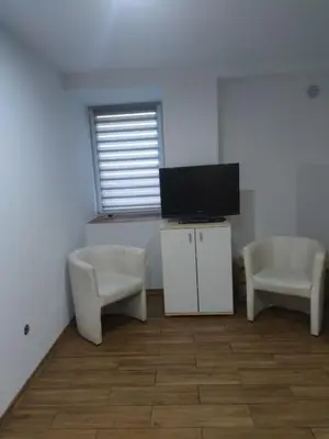 Telewizja i/lub zestaw kina domowego w obiekcie Noclegi kwatery dla firm