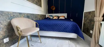 Łóżko lub łóżka w pokoju w obiekcie Apartament Azzurro - Old Town