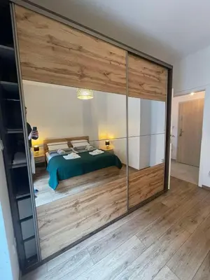 Łóżko lub łóżka w pokoju w obiekcie Apartament z dużym tarasem - najbliżej PreZero