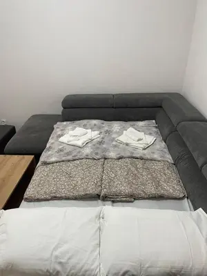 Łóżko lub łóżka w pokoju w obiekcie Apartament z dużym tarasem - najbliżej PreZero