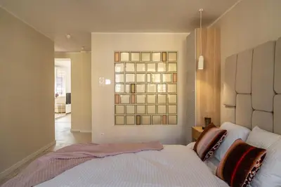 Łóżko lub łóżka w pokoju w obiekcie RentPlanet - Apartamenty Rynek