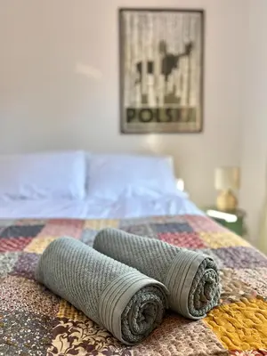 Łóżko lub łóżka w pokoju w obiekcie Apartament Rosalia