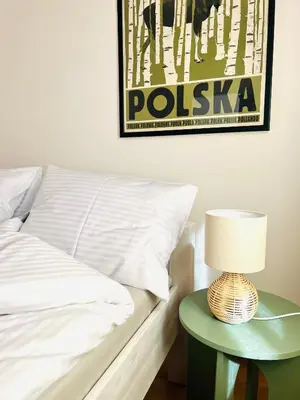 Łóżko lub łóżka w pokoju w obiekcie Apartament Rosalia