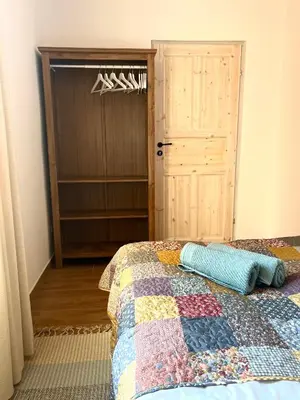 Łóżko lub łóżka w pokoju w obiekcie Apartament Rosalia