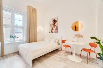 Łóżko lub łóżka w pokoju w obiekcie COMFISTAY Rynek 32A - Apartament na Starym Mieście