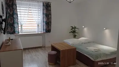 Łóżko lub łóżka w pokoju w obiekcie Apartament Aktywny Czas