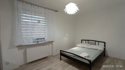 Łóżko lub łóżka w pokoju w obiekcie Apartament Aktywny Czas