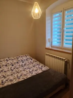 Łóżko lub łóżka w pokoju w obiekcie U Pauli Góry Sowie