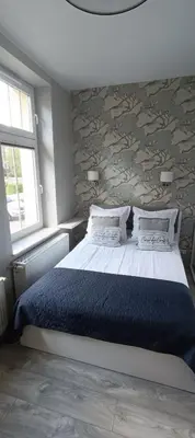 Łóżko lub łóżka w pokoju w obiekcie AP Apartment's Zielony