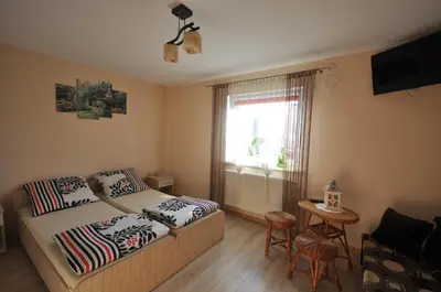 Łóżko lub łóżka w pokoju w obiekcie Noclegi u Agnieszki