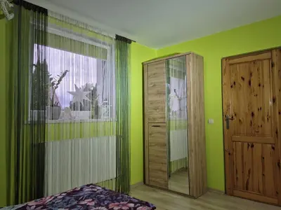 Łóżko lub łóżka w pokoju w obiekcie Noclegi u Agnieszki