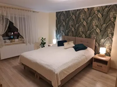 Łóżko lub łóżka w pokoju w obiekcie Noclegi u Agnieszki
