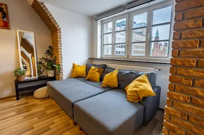 Część wypoczynkowa w obiekcie Zakątek Solny - przytulny apartament z widokiem na Ratusz