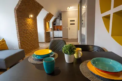Kuchnia lub aneks kuchenny w obiekcie Zakątek Solny - przytulny apartament z widokiem na Ratusz