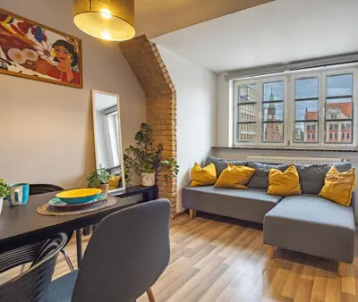 Część wypoczynkowa w obiekcie Zakątek Solny - przytulny apartament z widokiem na Ratusz