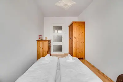 Łóżko lub łóżka w pokoju w obiekcie Rybacka 28 by Homeprime