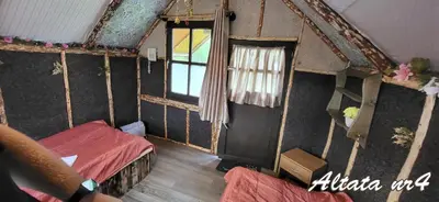 Łóżko lub łóżka w pokoju w obiekcie Altana letnia nr4 - Herbergerówka Agroturystyka na wsi