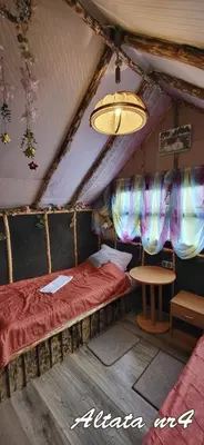 Łóżko lub łóżka w pokoju w obiekcie Altana letnia nr4 - Herbergerówka Agroturystyka na wsi