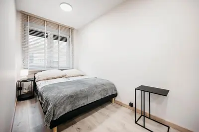 Łóżko lub łóżka w pokoju w obiekcie Nocosfera Premium Górnośląski