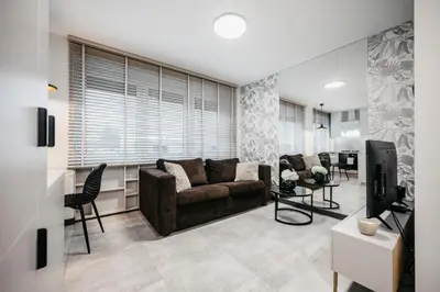 Telewizja i/lub zestaw kina domowego w obiekcie Nocosfera Premium Górnośląski