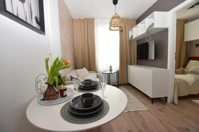 Telewizja i/lub zestaw kina domowego w obiekcie Apartamenty K netflix wi-fi