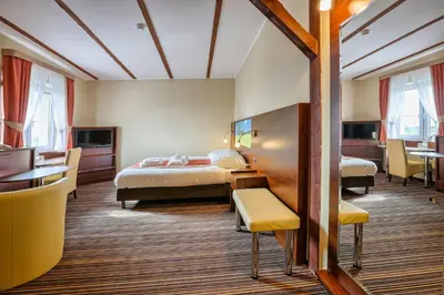 Łóżko lub łóżka w pokoju w obiekcie Sommer Residence Hotel&Spa