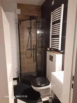 Łazienka w obiekcie Apartament HARMONIA ALCHEMIKA 2 łazienki SKI BUS