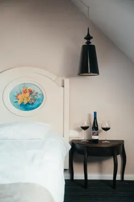 Łóżko lub łóżka w pokoju w obiekcie Winnice Jaworek