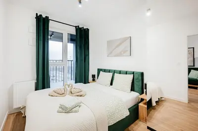 Łóżko lub łóżka w pokoju w obiekcie Legnicka Residence 37 C