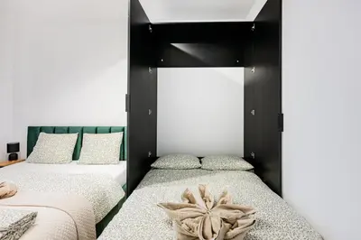Łóżko lub łóżka w pokoju w obiekcie Legnicka Residence 37 C