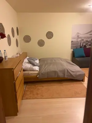 Łóżko lub łóżka w pokoju w obiekcie Noclegi Opole-Chmielowice Apartament A