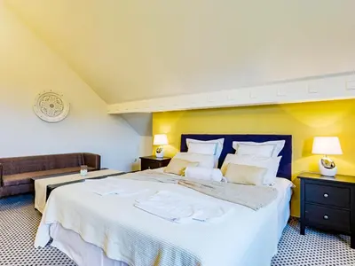 Łóżko lub łóżka w pokoju w obiekcie Hotel Magiczny Zakątek