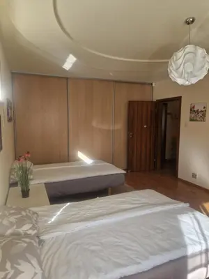 Łóżko lub łóżka w pokoju w obiekcie Noclegi Opole-Chmielowice Apartament B