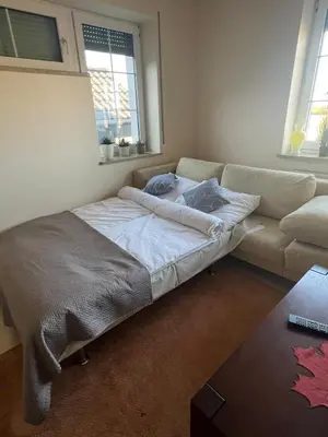 Łóżko lub łóżka w pokoju w obiekcie Noclegi Opole-Chmielowice Apartament B