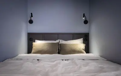 Łóżko lub łóżka w pokoju w obiekcie City Center Apartment 81 - ProperUNIT
