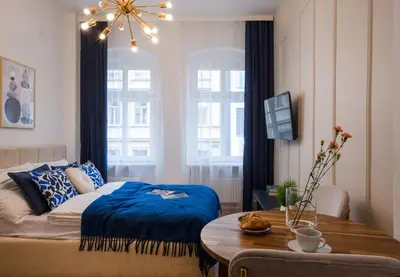 Łóżko lub łóżka w pokoju w obiekcie Neon 45 Apartment - ProperUNIT