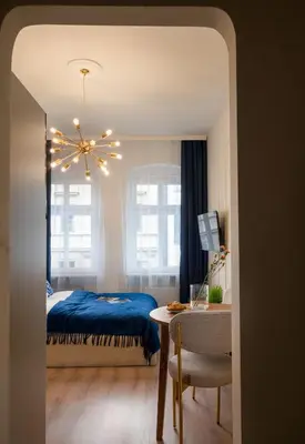 Łóżko lub łóżka w pokoju w obiekcie Neon 45 Apartment - ProperUNIT