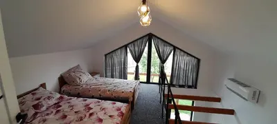 Łóżko lub łóżka w pokoju w obiekcie SIP-POL Domki nad Liswartą