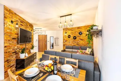 Telewizja i/lub zestaw kina domowego w obiekcie Apartament 10W Wrocław free private parking