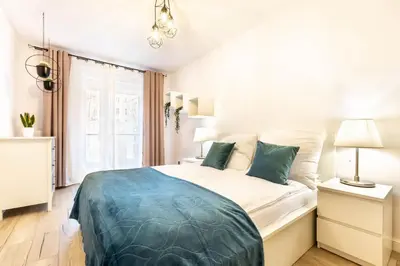 Łóżko lub łóżka w pokoju w obiekcie Apartament 10W Wrocław free private parking