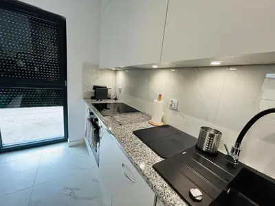 Kuchnia lub aneks kuchenny w obiekcie II Apartament-Free Parking 10 min Rynek i PKP