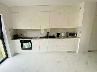 Kuchnia lub aneks kuchenny w obiekcie II Apartament-Free Parking 10 min Rynek i PKP