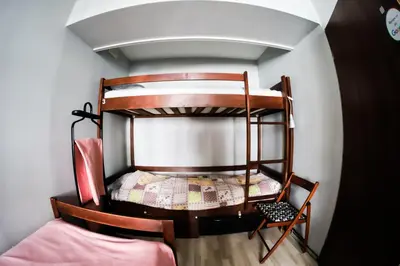 Łóżko lub łóżka w pokoju w obiekcie Sunny Hostel 49
