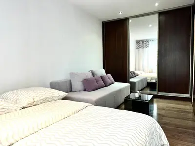Łóżko lub łóżka w pokoju w obiekcie Chrobrego Apartment - Self check-in 20h - parking