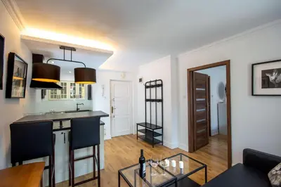 Kuchnia lub aneks kuchenny w obiekcie Perła Rynku - urokliwy apartament w samym centrum