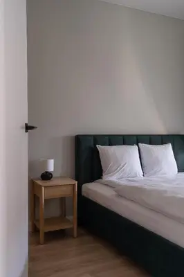 Łóżko lub łóżka w pokoju w obiekcie RentPlanet - Apartament Jęczmienna