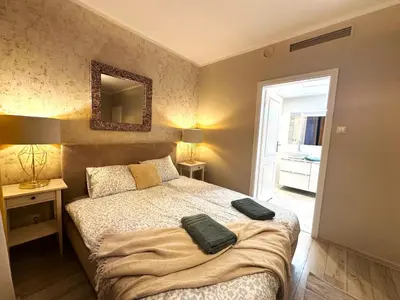 Łóżko lub łóżka w pokoju w obiekcie Apartament Centrum Krawiecka Rynek