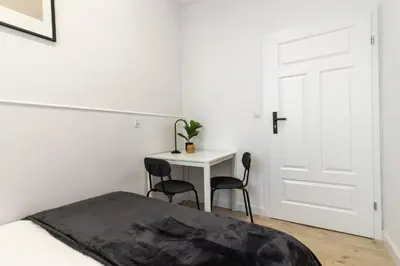 Łóżko lub łóżka w pokoju w obiekcie Old Town CityStay Rynek